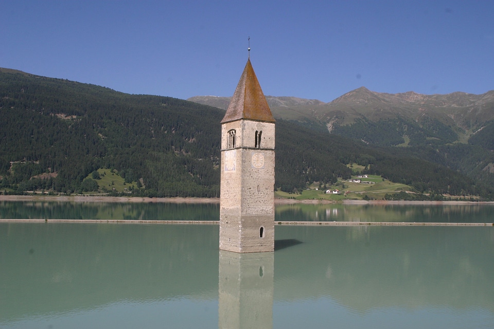 Sunken church lake mountains