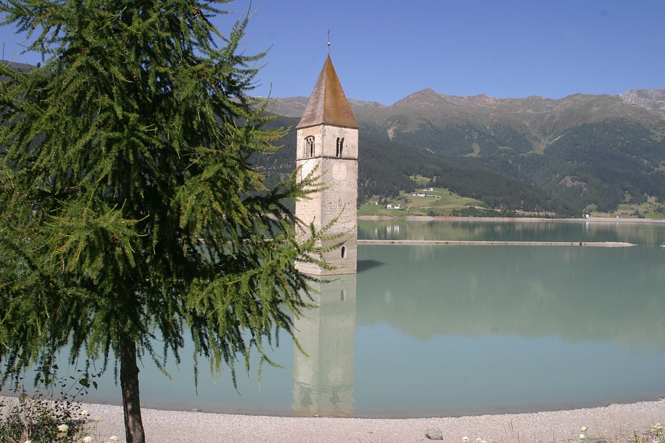 Sunken church lake mountains