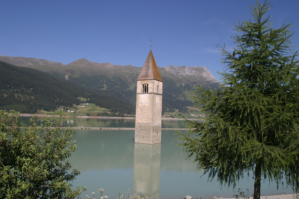 Sunken church lake mountains