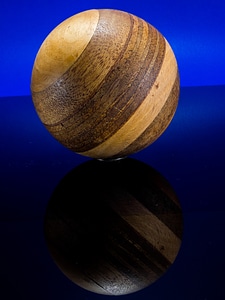 Wooden ball turned hand labor photo