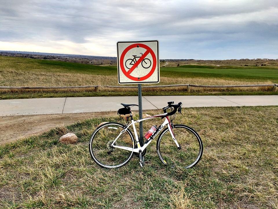 Sign warning mountain bike