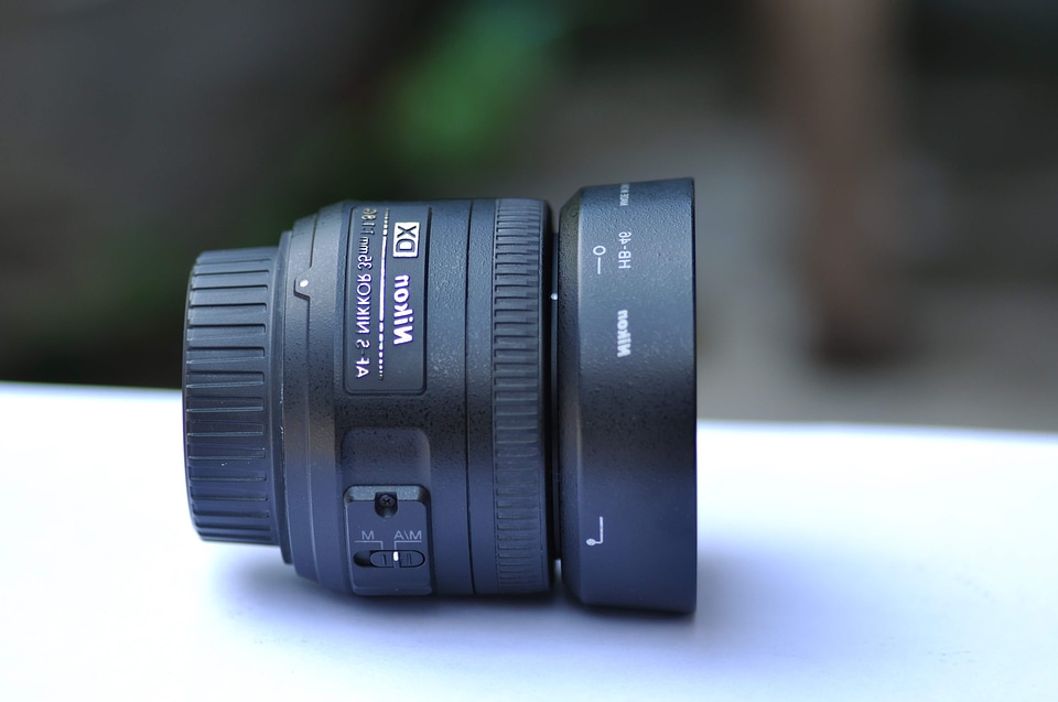 Aperture black button