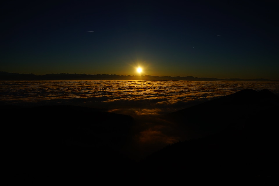 Backlight cloud coast