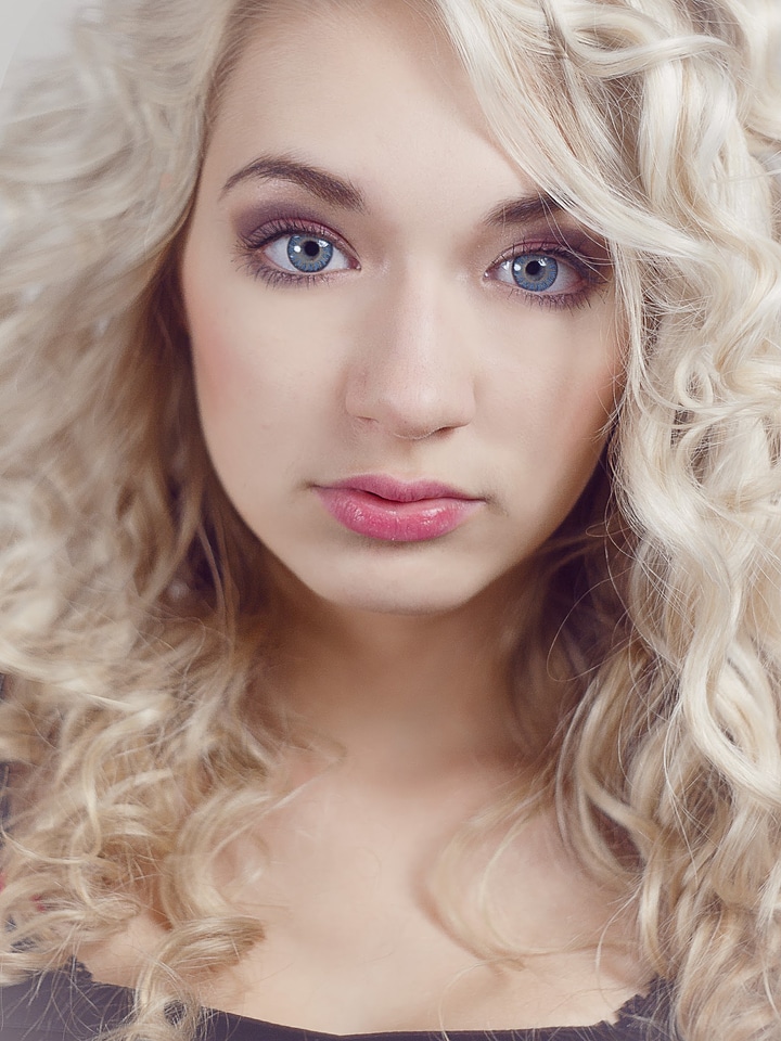 Blondie blue eyes black dress