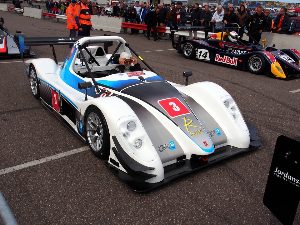 Racing vehicle driver