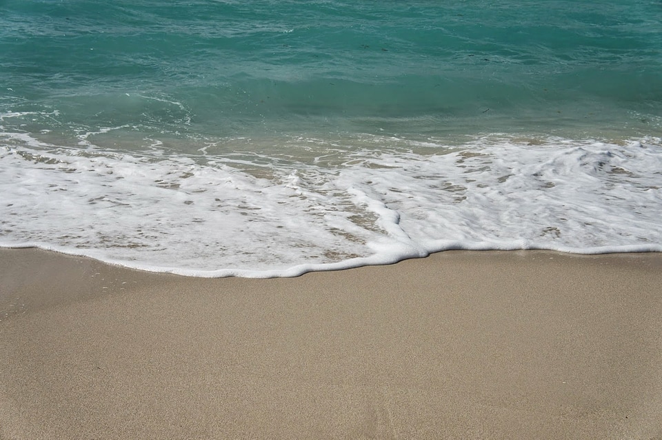 Sand sea wave photo