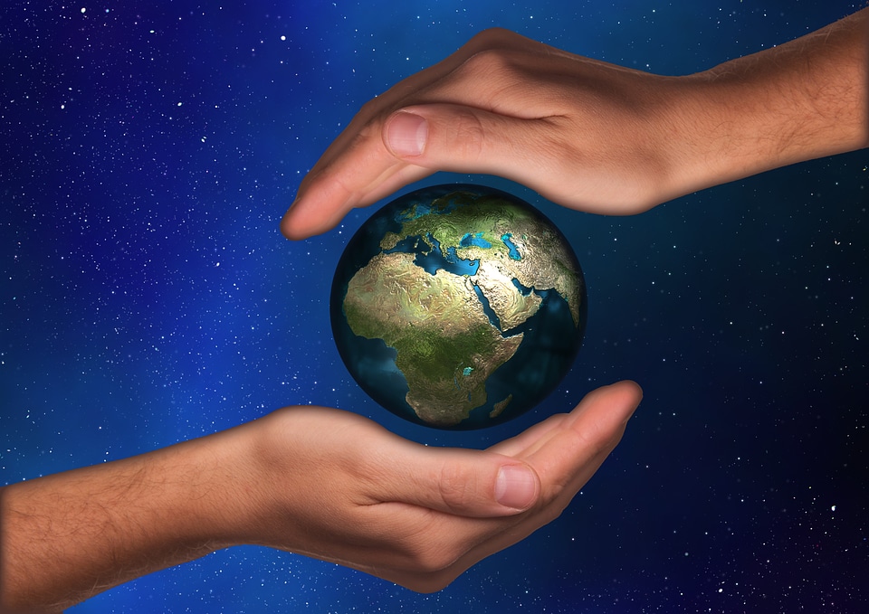 Handful of earth globe