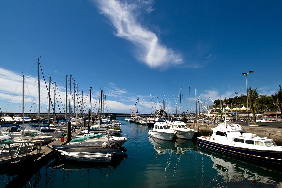 Sailing boats mirroring port
