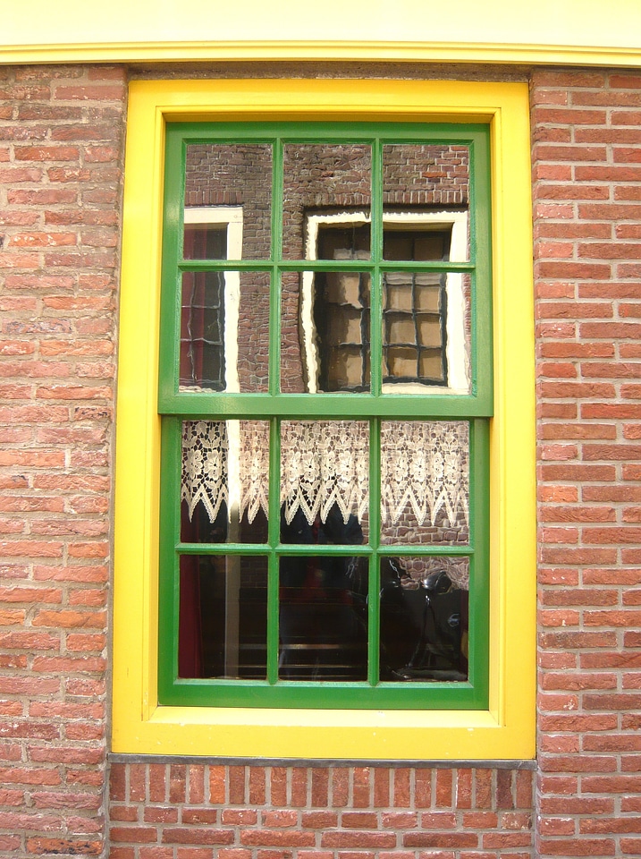 Yellow green reflection in the window
