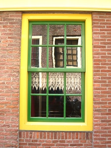 Yellow green reflection in the window