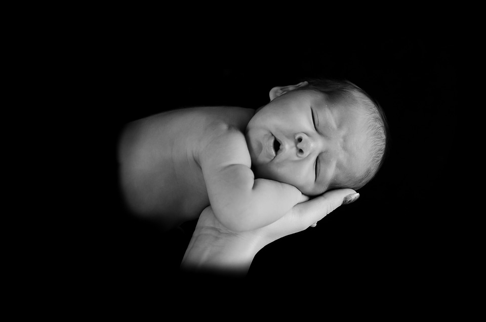 Baby birth black and white photo