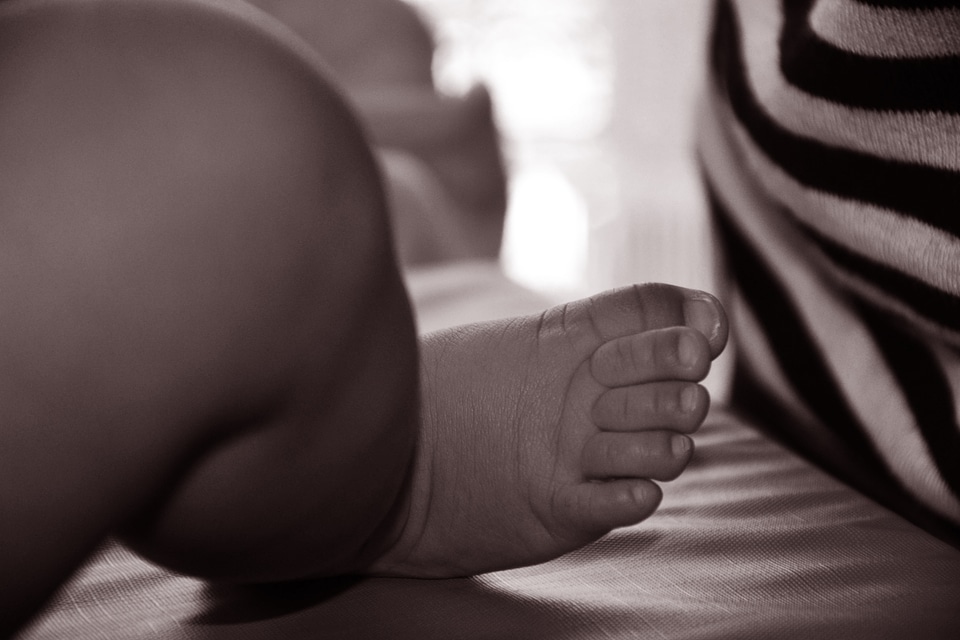 Child birth black white