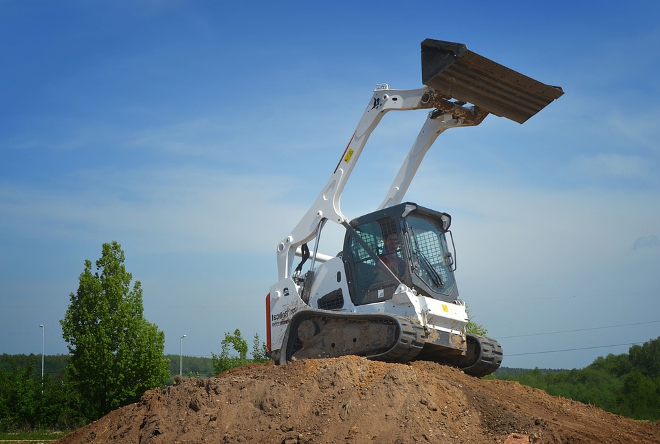 Excavator flora grass