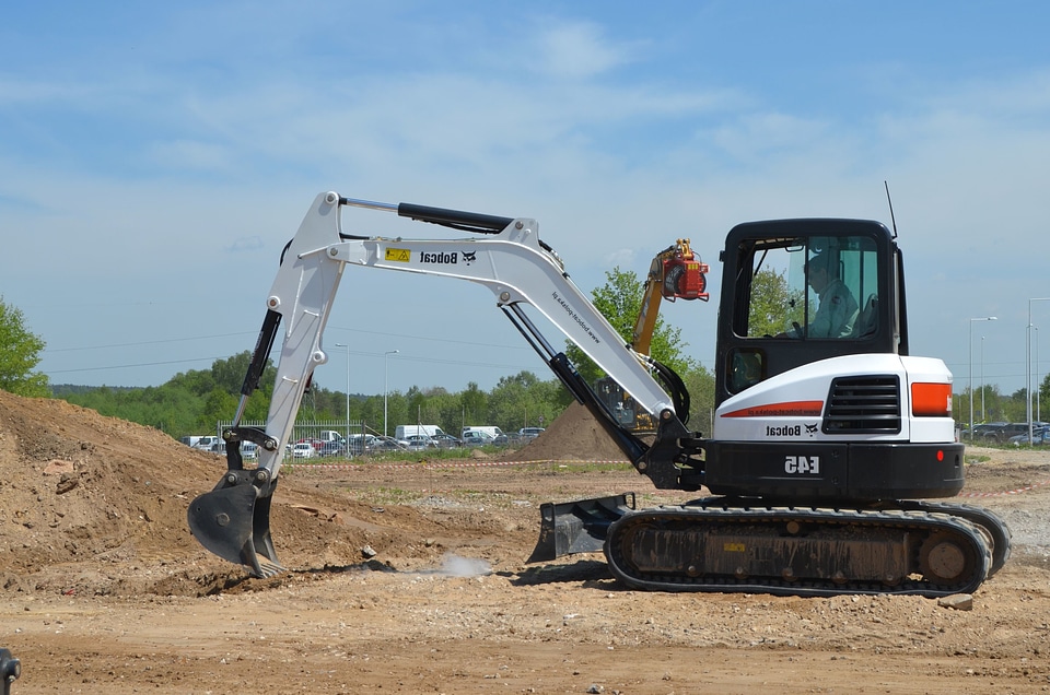 Construction Worker excavator ground