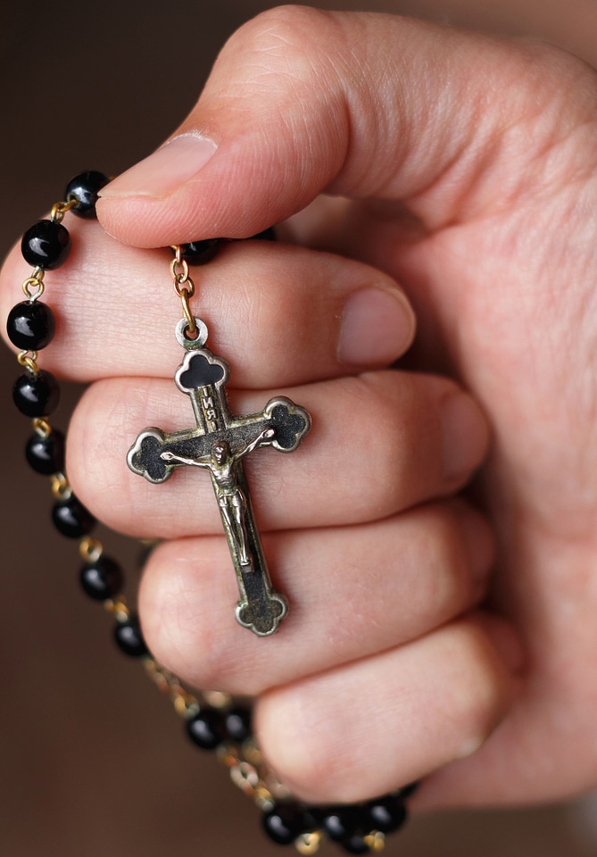 Christian cross hand