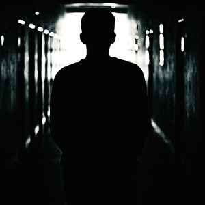 Dark indoors man photo