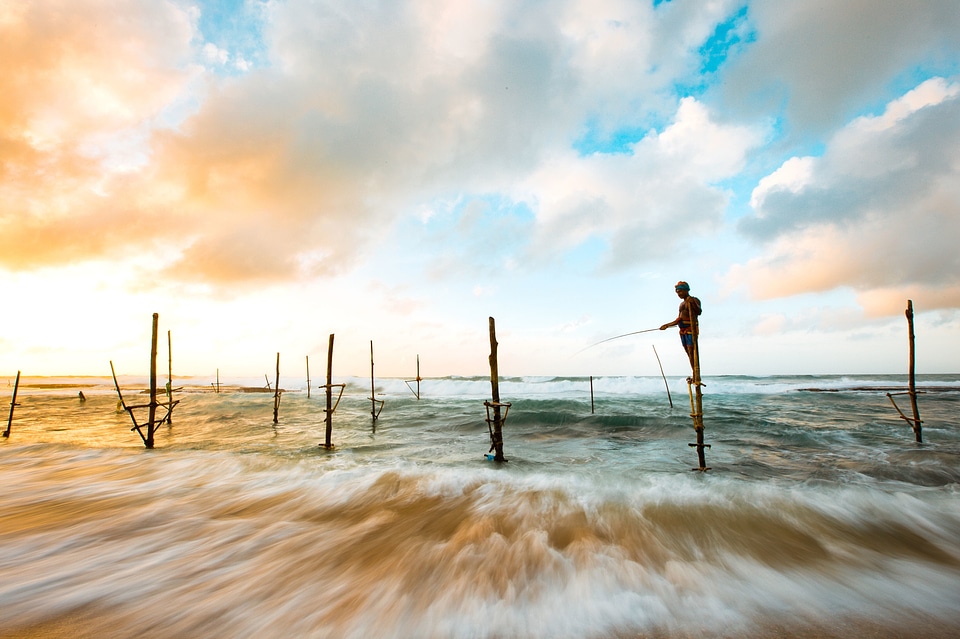 Beach clouds fishing