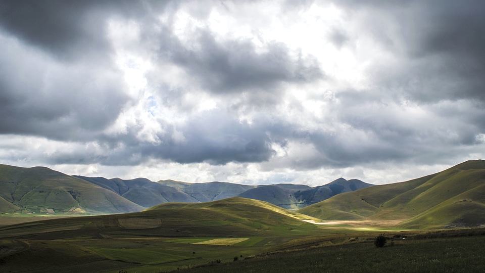 Clouds field mountain photo