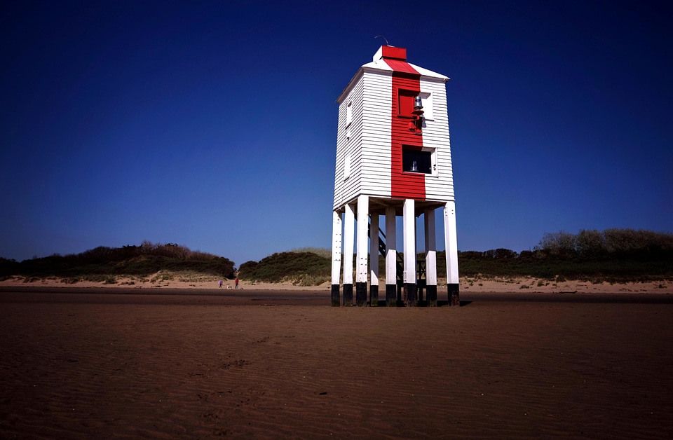 Beach dusk lighthouse