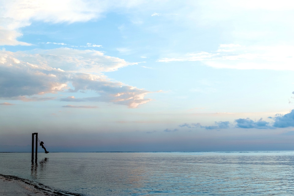 Beach blue sky clouds
