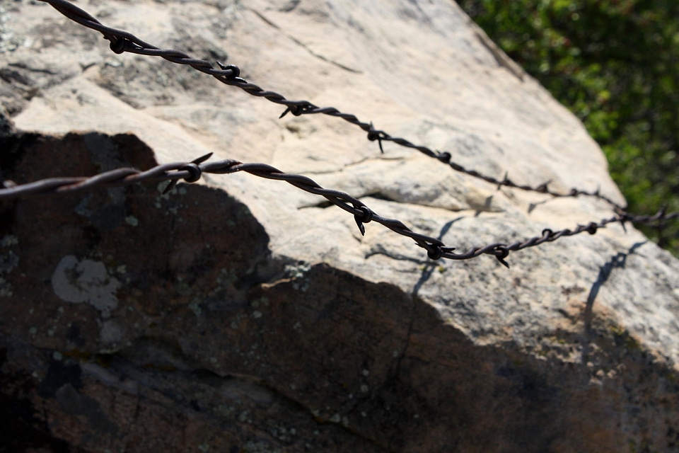Barbed Wire big rocks rust