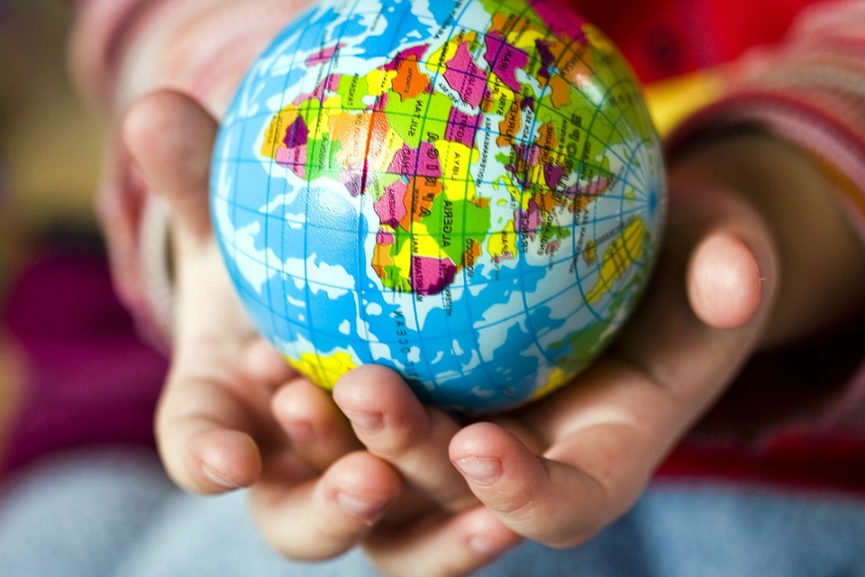 Colorful globe hands