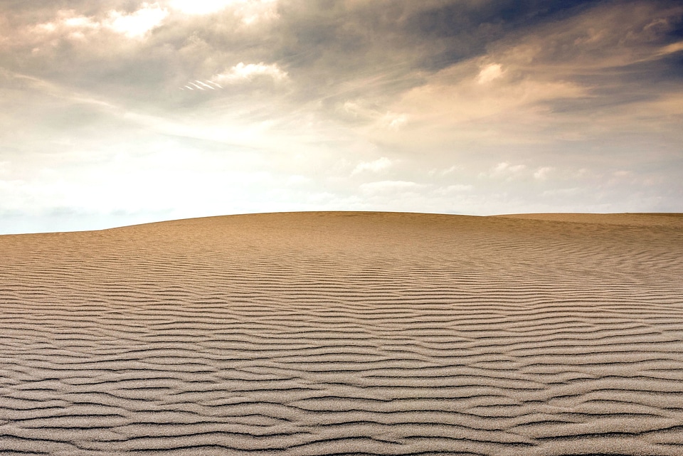 Clouds desert sand