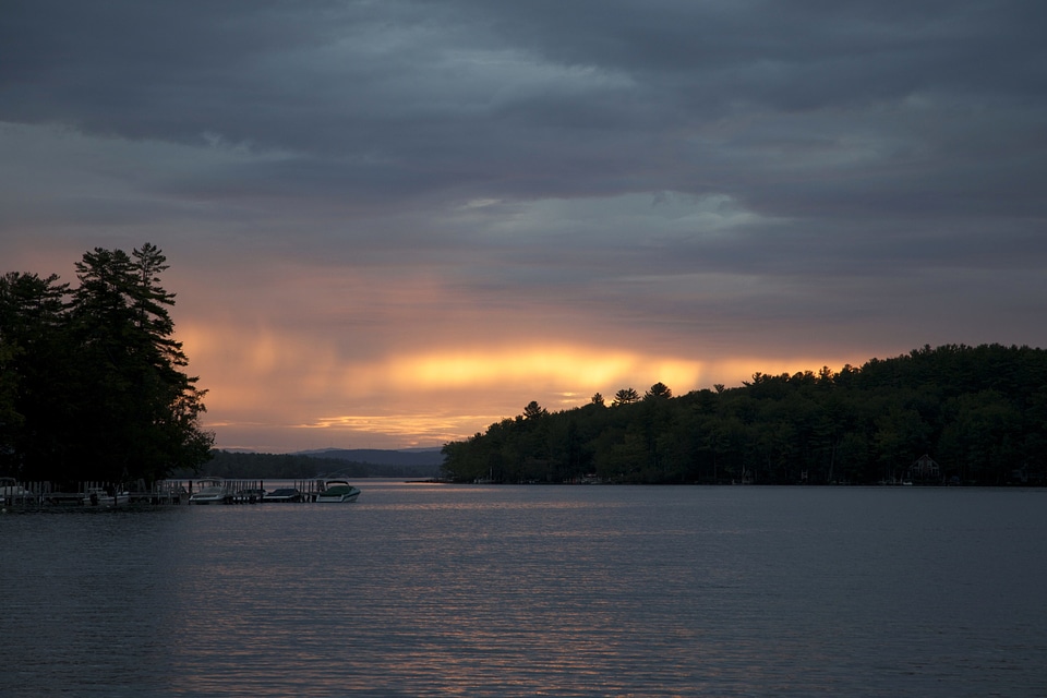 Boats clouds lake