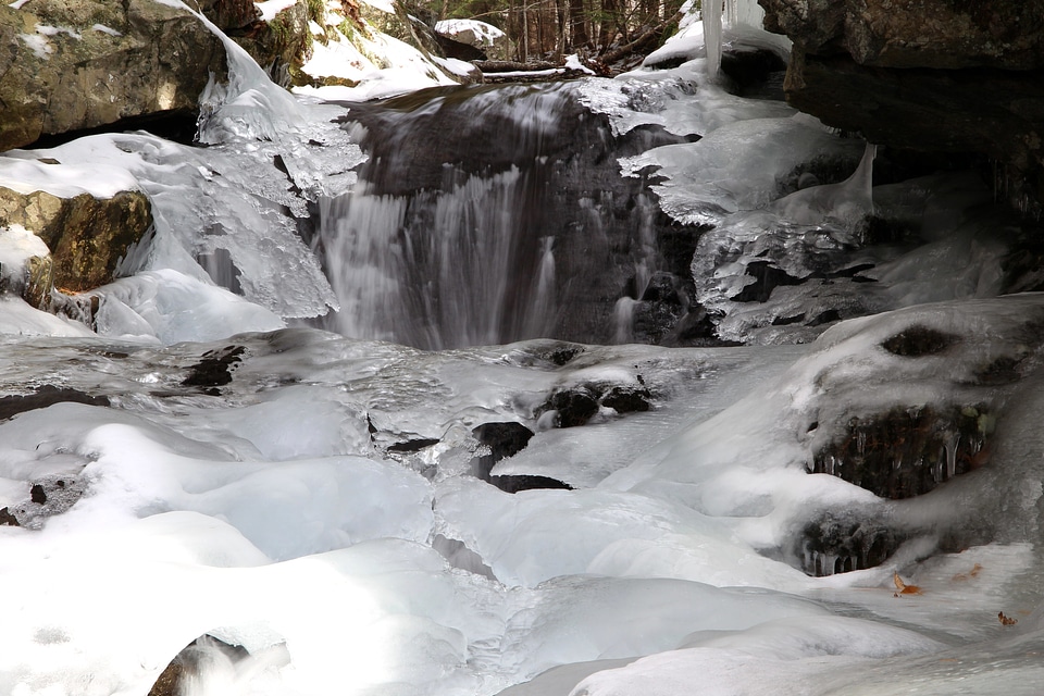 Frosty rocky river snow