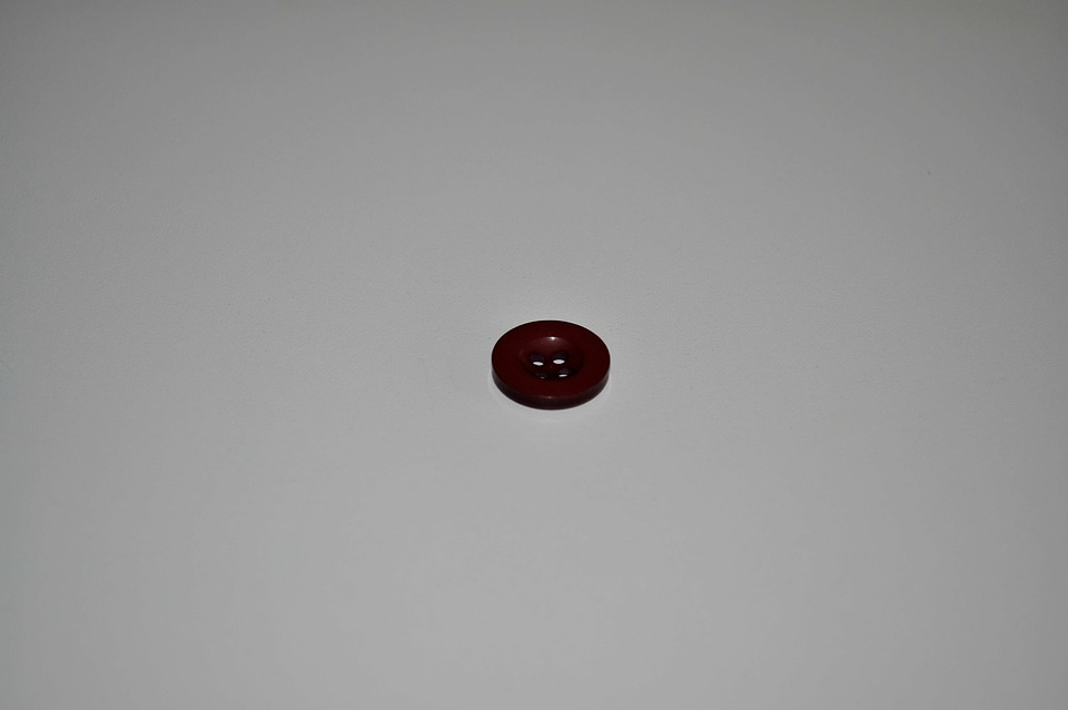 Black button sewing