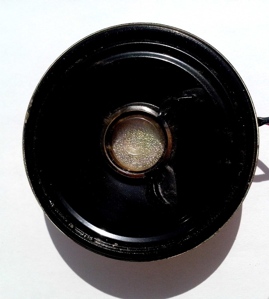Background black loudspeaker