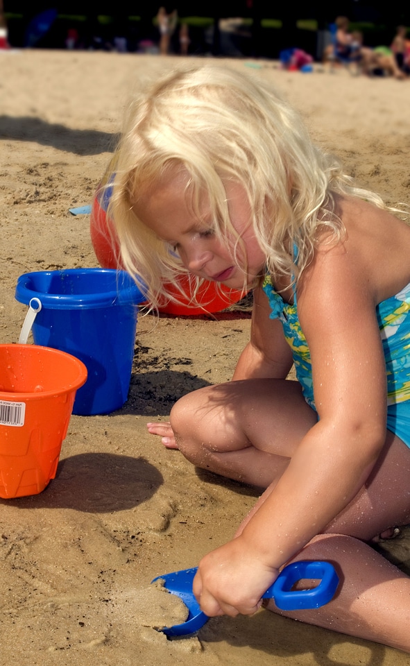 Female Child lakes playing