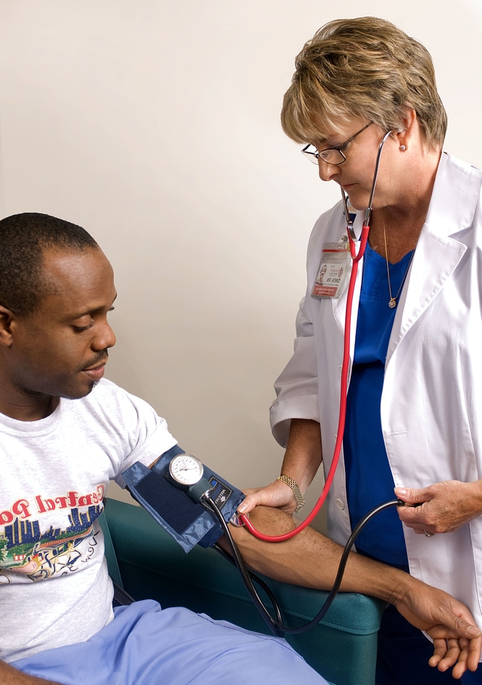 Doctor physical exam sphygmomanometer photo