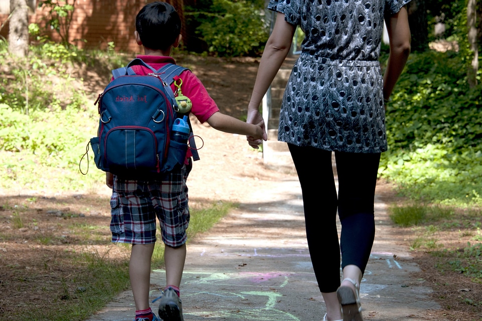 Going hand school child