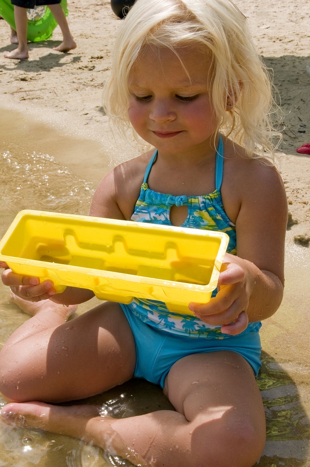 Babies blonde hair diving suit