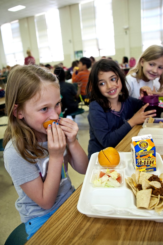 Eat female child orange
