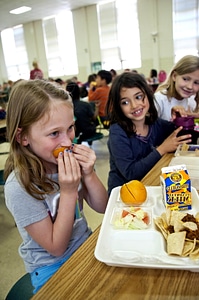Eat female child orange