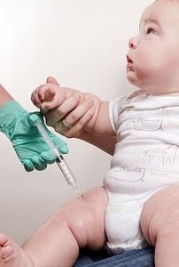 Baby injection muscle photo