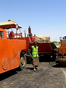 Asphalt burrow construction worker photo