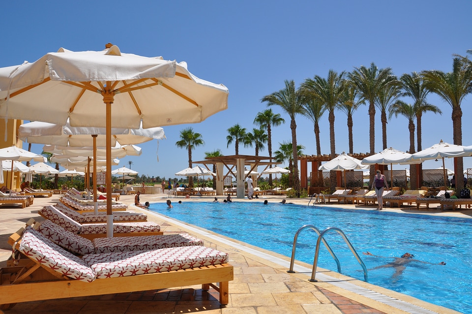 Swimming pool vacations parasol