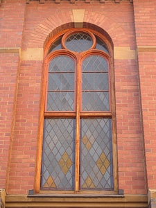 Decorative window church red brick photo