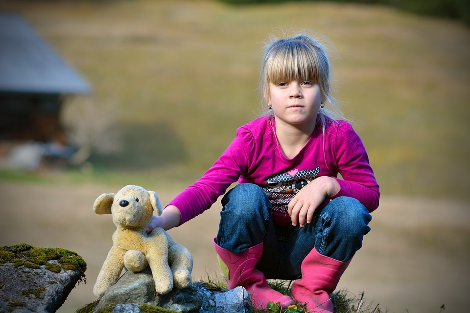 Girl stuffed animal nature