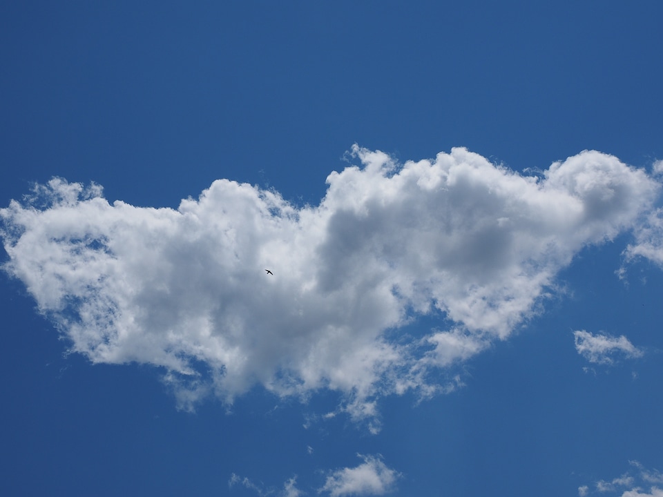 Blue clouds form white
