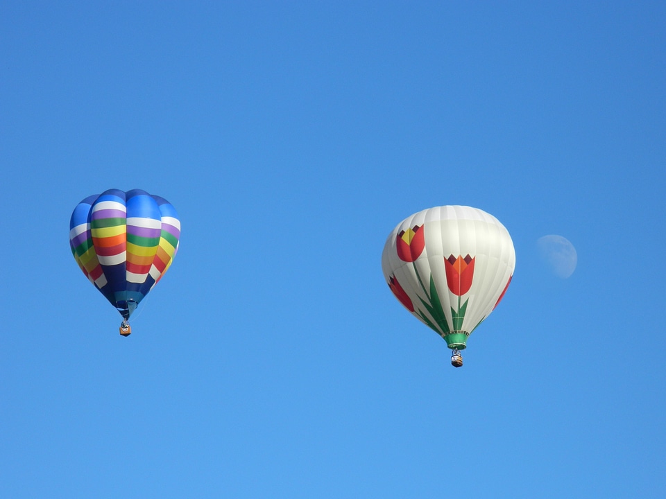 Blue sky floating balloon photo