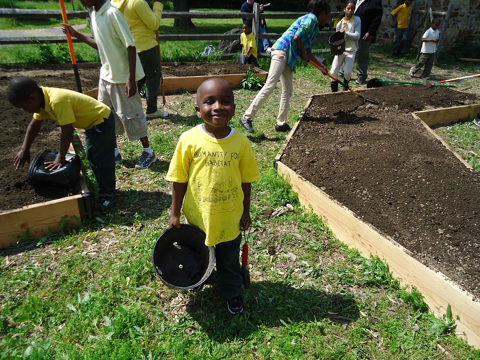 Babies garden helping