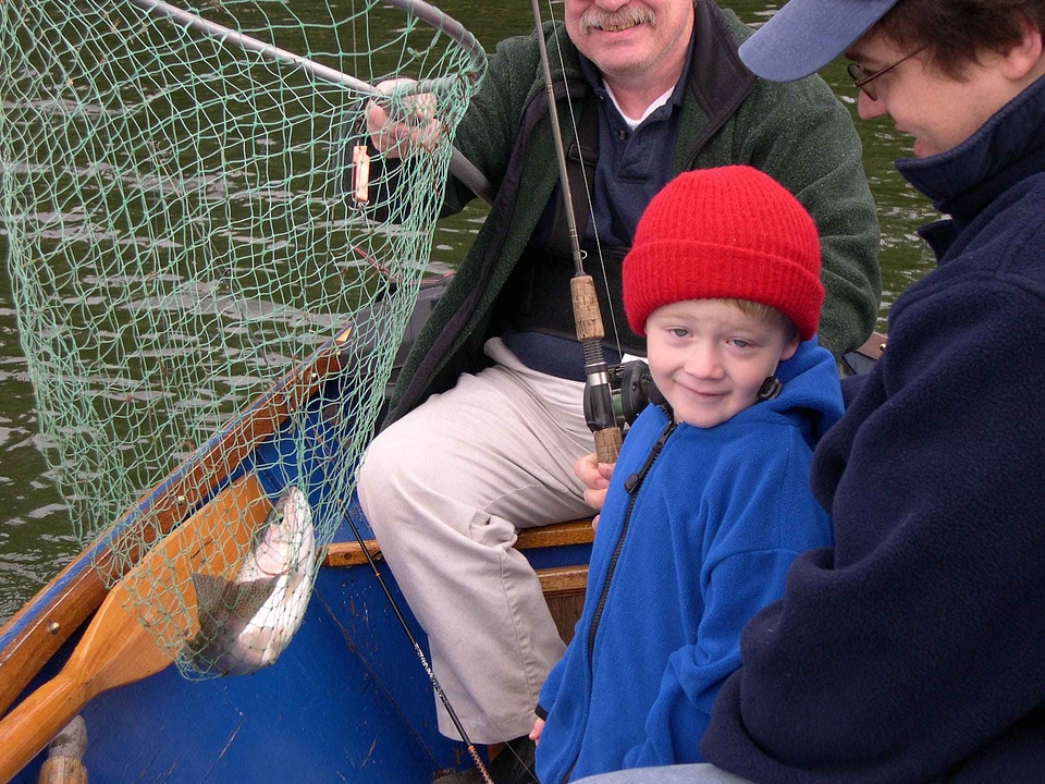 Boy fish fishing boat