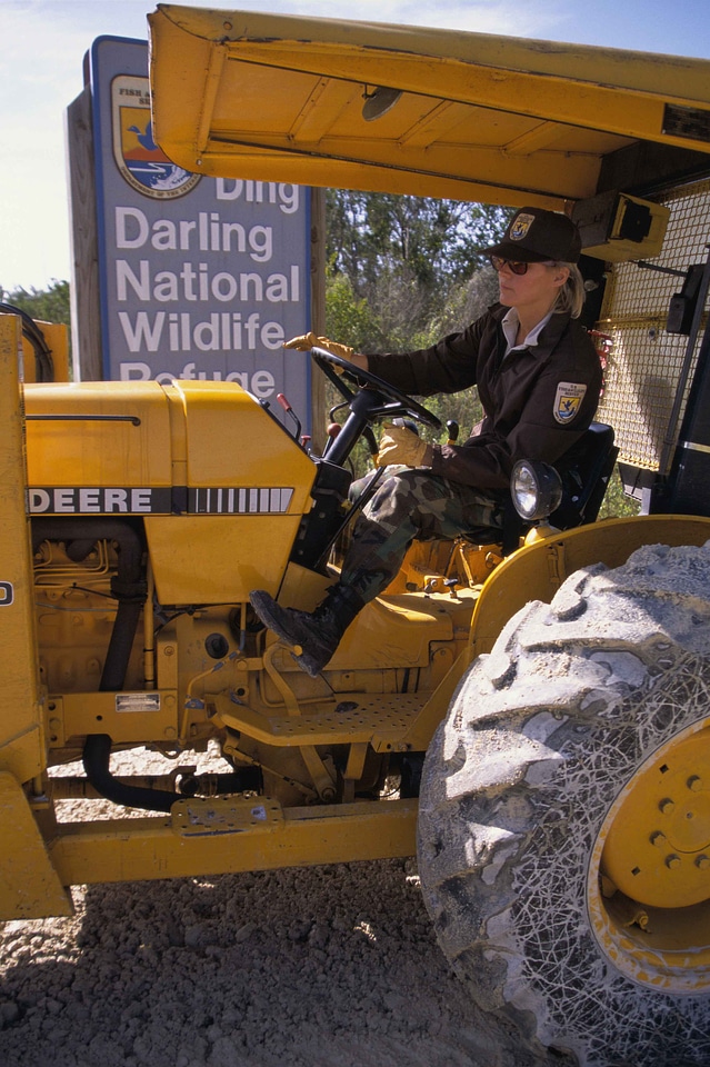 Construction Worker driving equipment