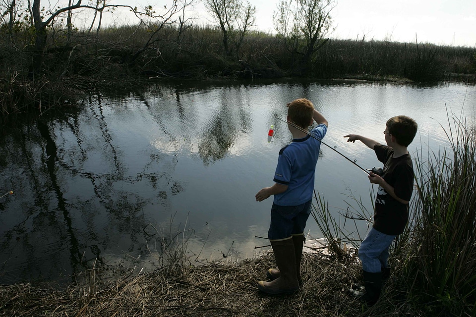 Boys enjoy fishery
