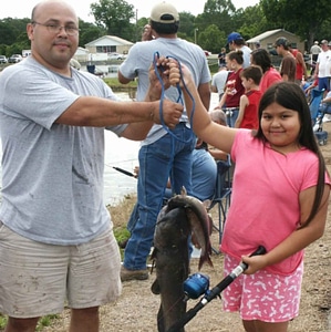 Daughter father fish photo