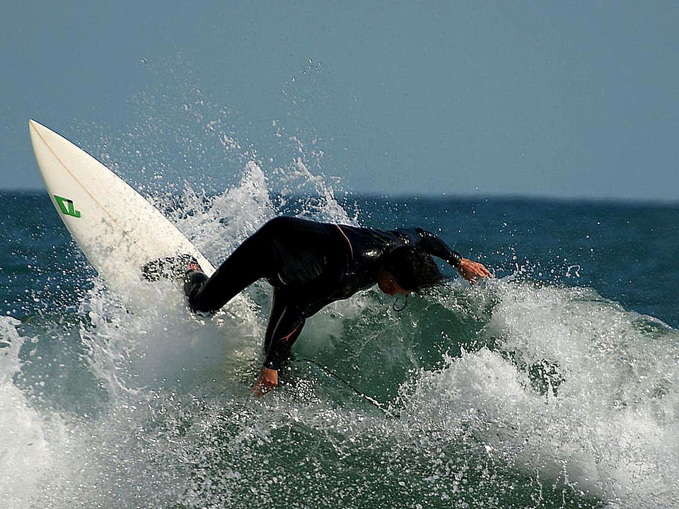 Aquatic jump surfer photo